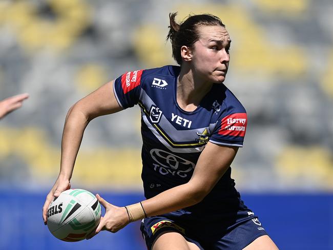 TOWNSVILLE, AUSTRALIA - AUGUST 17: Kirra Dibb of the Cowboys passes the ball during the round four NRLW match between North Queensland Cowboys and Gold Coast Titans at Queensland Country Bank Stadium on August 17, 2024 in Townsville, Australia. (Photo by Ian Hitchcock/Getty Images)