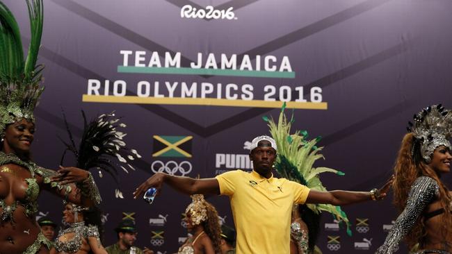 Bolt’s press conference was complete with Samba dancers.