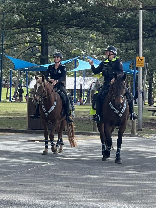 Senior Constable Tara Neiland with 'Nitro' and Senior Constable Simon Shilton with 'Stormy' at Burleigh Heads on Friday April 26. Picture: Keith Woods.