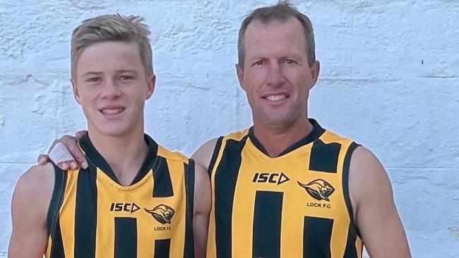 Andrew Hetzel with son Tait. Picture: Lock Roos Football Club