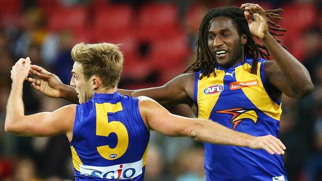 SYDNEY, AUSTRALIA - AUGUST 13: Brad Sheppard and Nic Naitanui of the Eagles celebrate a goal during the round 21 AFL match between the Greater Western Sydney Giants and the West Coast Eagles at Spotless Stadium on August 13, 2016 in Sydney, Australia. (Photo by Mark Nolan/Getty Images)