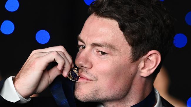 Lachie Neale poses with the Brownlow medal at the Gabba. Picture: Quinn Rooney/Getty Images