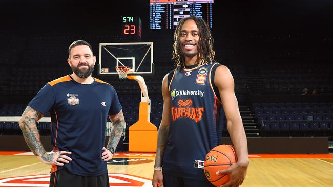 The Cairns Taipans, including coach Adam Forde and player Tahjere McCall, will return to their home of the Cairns Convention Centre. Picture: Brendan Radke