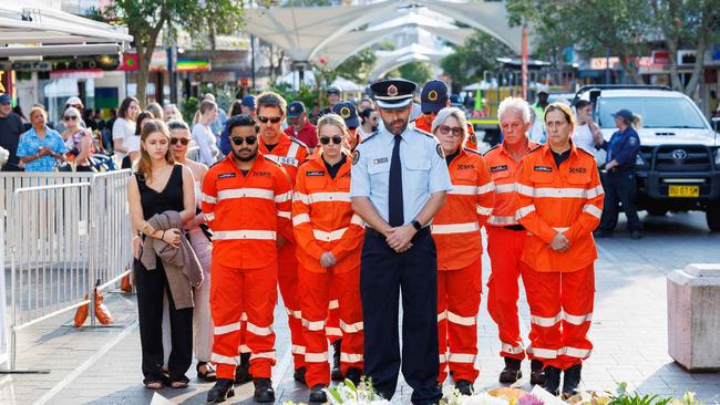 Emergency service workers pay their respects to the victims. Picture: NCA NewsWire / David Swift