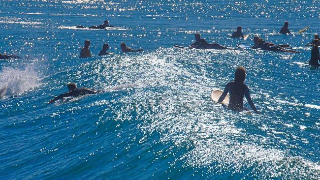 Research shows wave riders are more likely to have E coli in their gut than non-surfers. Picture: Adam Hourigan