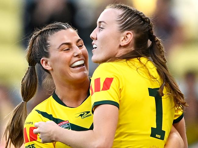 TOWNSVILLE, AUSTRALIA - OCTOBER 14: Jessica Sergis of the Jillaroos celebrates with Tamika Upton of the Jillaroos after she scored a try during the Womens Pacific Championship match between the Australia Jillaroos and New Zealand Kiwi Ferns at Queensland Country Bank Stadium on October 14, 2023 in Townsville, Australia. (Photo by Ian Hitchcock/Getty Images)