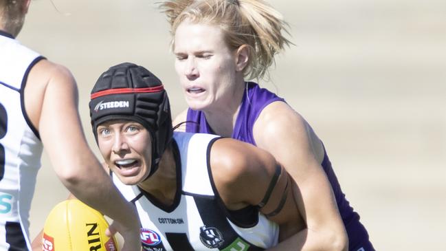 Brittany Bonnici is tackled by Dana Hooker. Picture: AAP Images 