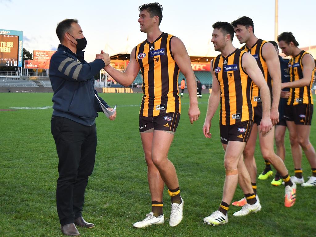 Alastair Clarkson congratulates the players on the win during the round 19 AFL match between Hawthorn Hawks and Brisbane Lions.