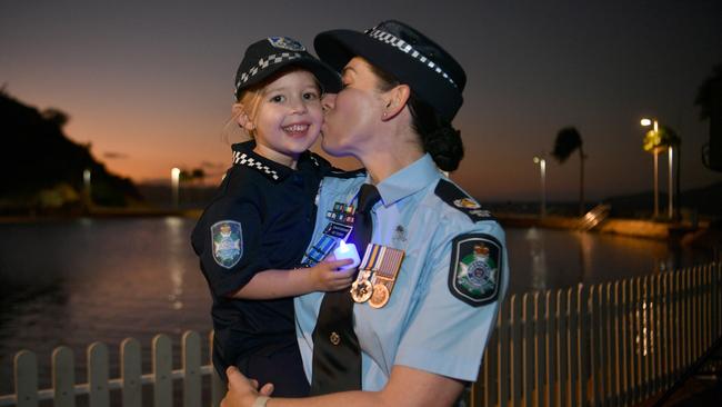 National Police Remembrance Candlelight Vigil 2023 at the Rockpool, Townsville. Senior Sergeant Rebecca Tucker with Natasha, 4. Picture: Evan Morgan