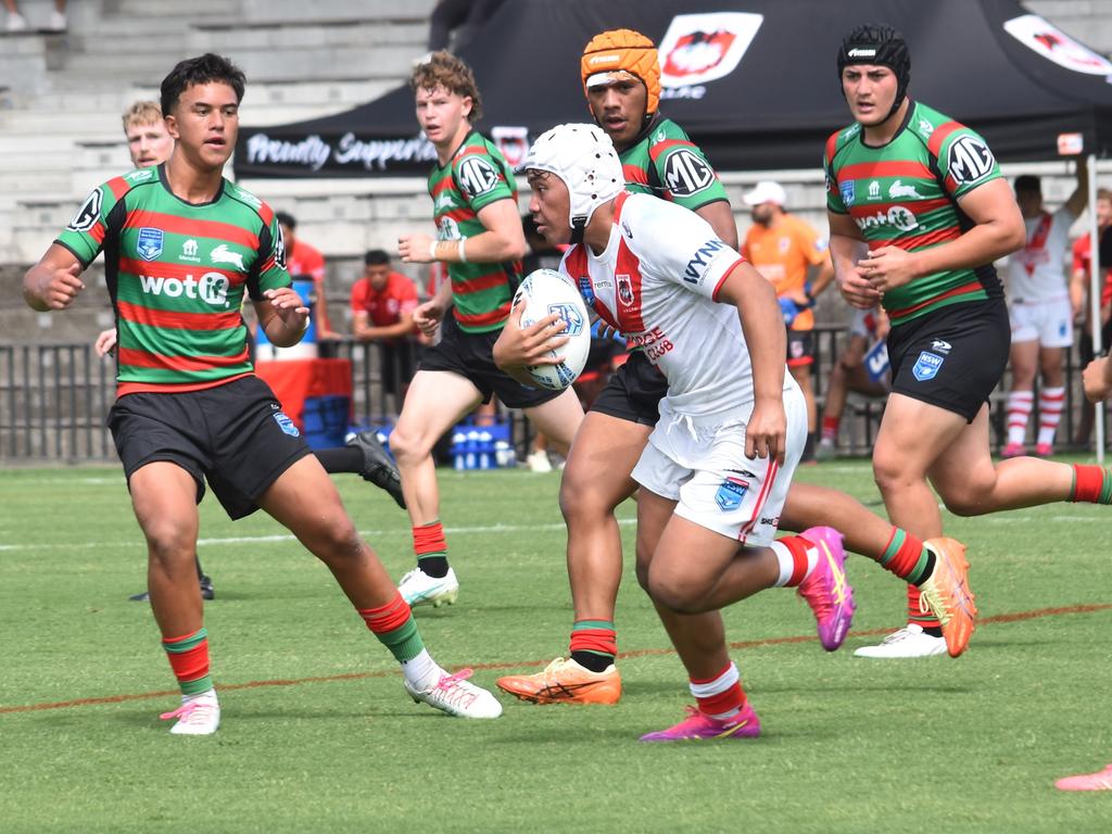 Lino Tamaseu runs at Jahzelle Lokeni. Picture: Sean Teuma