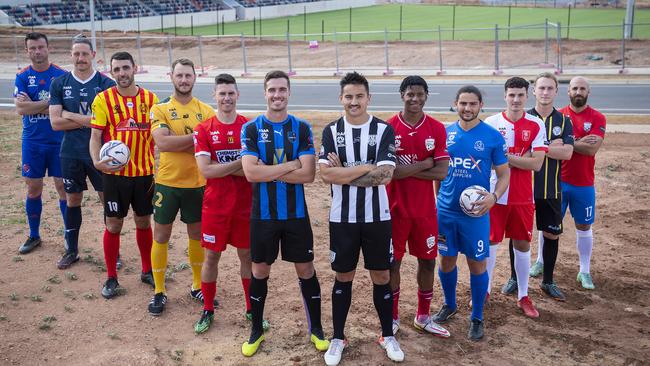 National Premier League SA players John Fusco (Sturt Lions), Robert Parker (South Adelaide), Anthony Solana (Metro Stars), Jack Schoen (Cumberland United), Joel Allwright (Campbelltown City), Allan Welsh (Adelaide Comets), Matt Halliday (Adelaide City), Panashe Madanha (Adelaide United FC), Christos Pounendis (Adelaide Olympic), Adam Martinelli (Croydon FC), Chris Ashwood (WT Birkalla) and Chahine Noujam of (FK Beograd) in front of the under construction State Centre for Football at Gepps Cross. Picture: Mark Brake