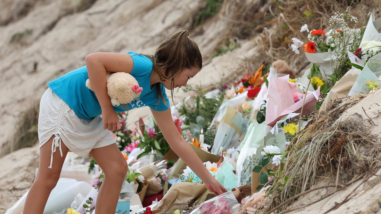 Flowers left for Charlize Zmuda at Woorim beach, Bribe Island. Picture: Liam Kidston