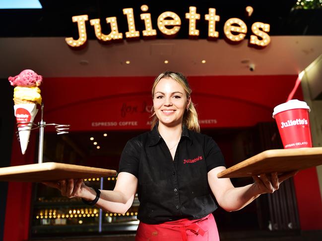 Juliette's The Strand supervisor Carolin Rippel practices social distancing regulations when serving her customers. Picture: Shae Beplate.