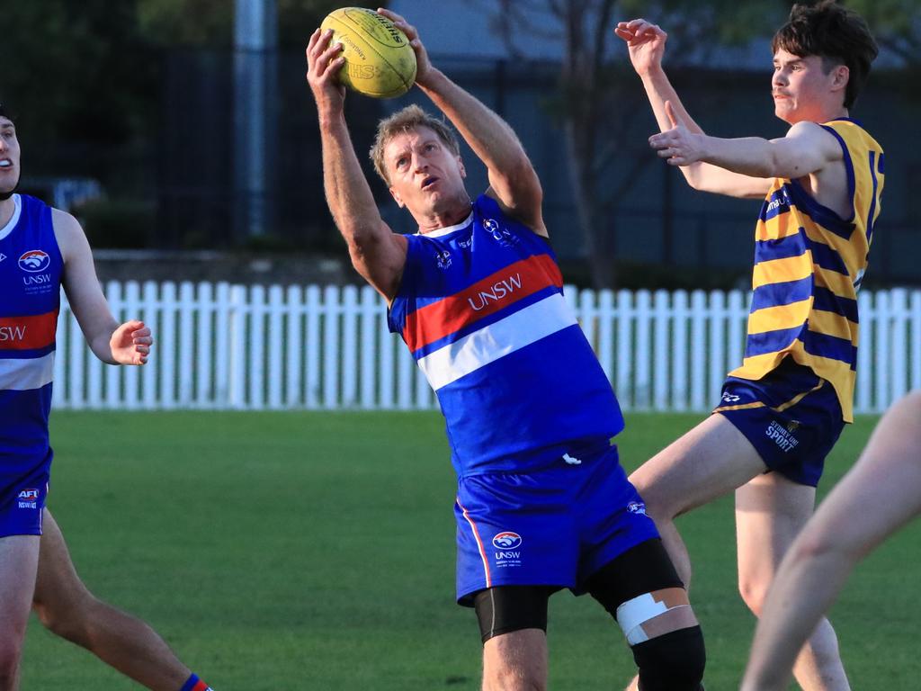 Troy Luff takes a mark in his 600th game. Picture: Leigh Gazzard