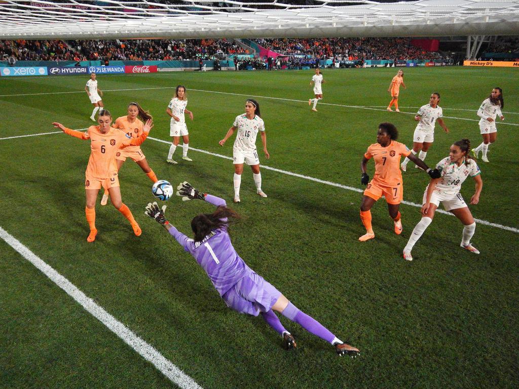 In an image taken from a remote camera inside the goal, Ines Pereira of Portugal dives in vain as Stefanie Van Der Gragt (not pictured) of Netherlands scores in Dunedin. Picture: Lars Baron/Getty Images