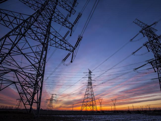 The silhouette of the evening electricity transmission pylon. Istock