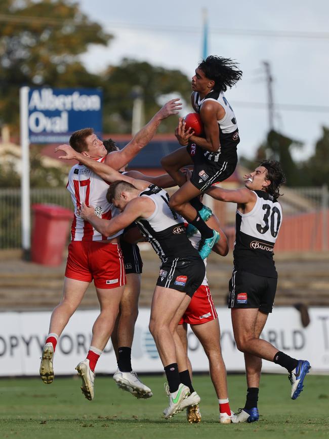 Jase Burgoyne flies high for a hanger in the SANFL. Picture: SANFL Image/David Mariuz