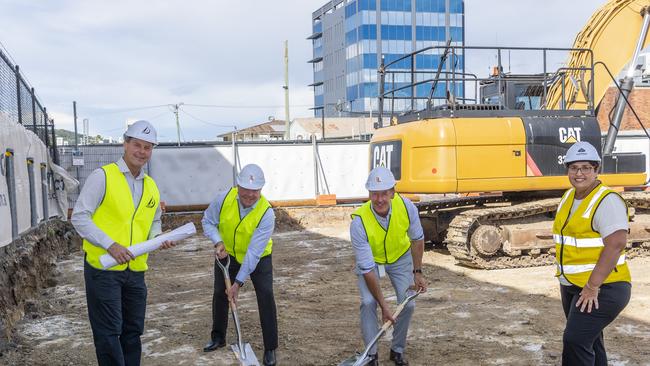 Logan mayor Darren Power, second right, at a photo shoot with Alder Developments managing director Greg Alder, InvestLogan chair Steve Greenwood and Cr Karen Murphy with Beenleigh’s only high rise The Exchange in the background.