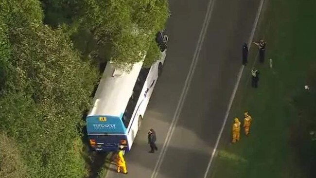 Fifteen children had to be freed from their school bus after it went down an embankment. Picture: Channel 9