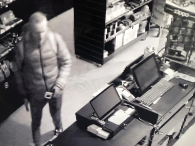 A security camera image of a man inside a tobcconist on Sydney Rd, Manly. who allegedly went on a vandalism rampage between Allambie Heights and the Manly CBD on Monday. Picture: King of the Pack Manly