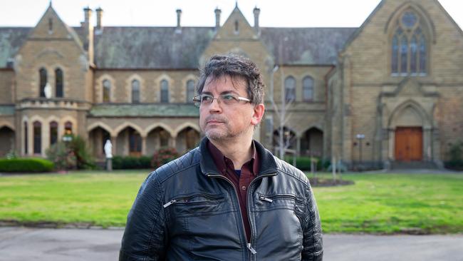 School parent Ian Sands outside the college gates after the closure was announced. Picture: Sarah Matray