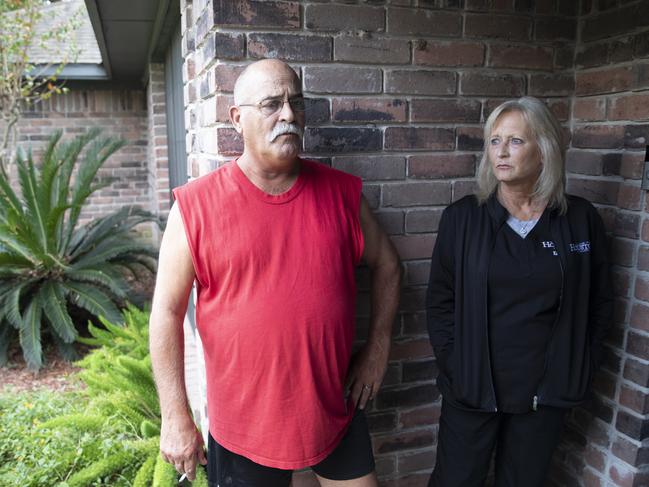 Neighbours Haskell and Kim Ray said they heard a car “screeching away” following the shooting. Picture: Scott Dalton