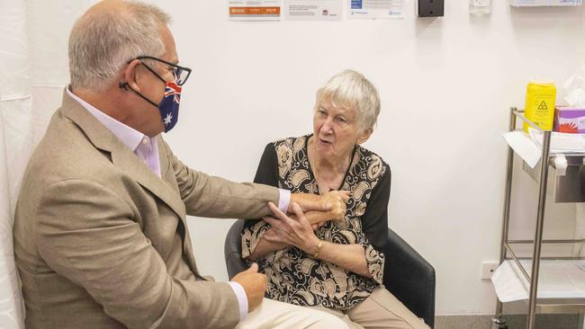 The cheeky 84-year-old had the PM in fits of laughter during the historic vaccination. Picture: NCA NewsWire / Jenny Evans