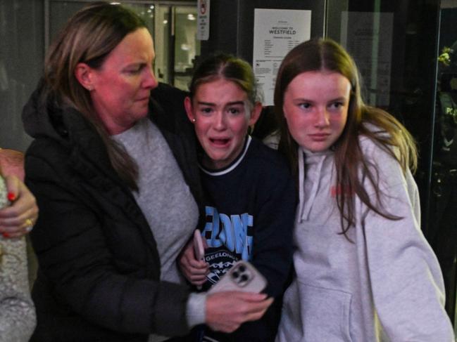 ADELAIDE, AUSTRALIA - NewsWire Photos JUNE 23, 2024: Relieved customers leave the Westfield Marion where armed gangs were reported inside. Picture: NewsWire / Brenton Edwards