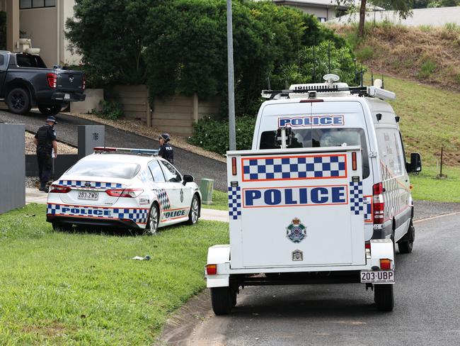 A Queensland Police mobile police facility van and trailer is set up at Verbena Street, Mt Sheridan, after the sudden death of a man and a woman on Tuesday night. Picture: Brendan Radke