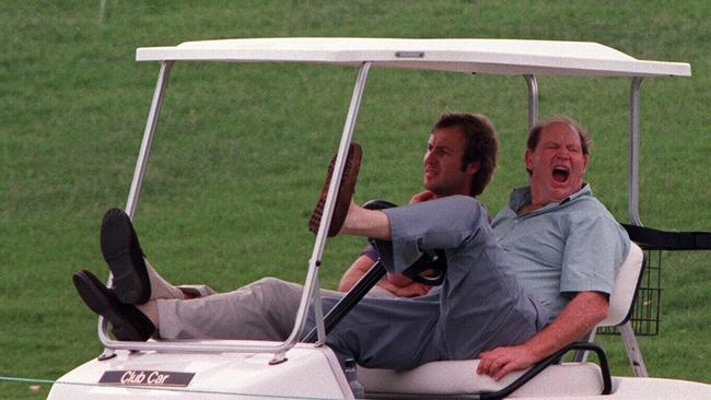 Kerry Packer, a fellow insomniac, yawns as he watches Jack Nicklaus during a round of golf. He had a novel way of dealing with the condition.