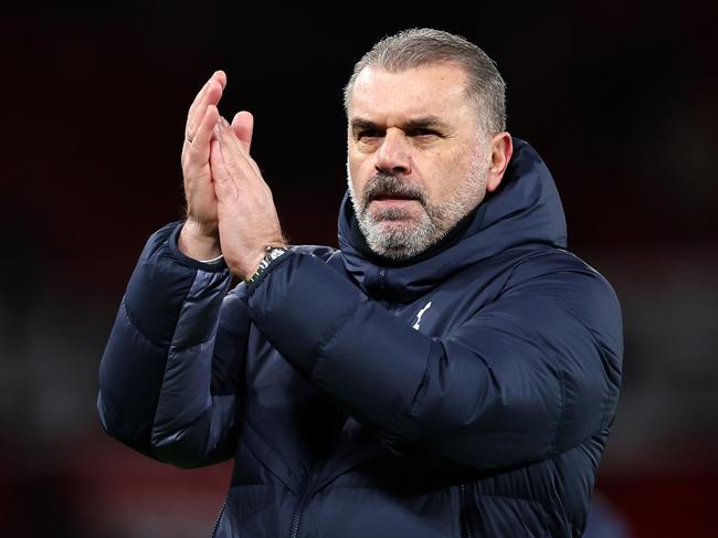 MANCHESTER, ENGLAND - JANUARY 14: Ange Postecoglou, Manager of Tottenham Hotspur, acknowledges the fans following the Premier League match between Manchester United and Tottenham Hotspur at Old Trafford on January 14, 2024 in Manchester, England. (Photo by Catherine Ivill/Getty Images)