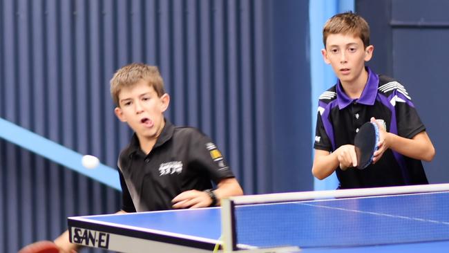 The Mackay Table Tennis accommodates people of all ages. Pictured is Oscar Savige and Ben Symons.