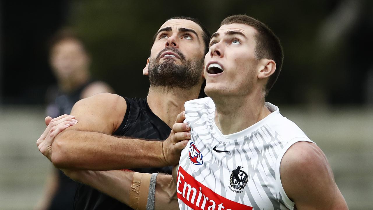 MELBOURNE, AUSTRALIA - FEBRUARY 12: Brodie Grundy (L) and Mason Cox of the Magpies compete during a Collingwood Magpies AFL training session at Holden Centre on February 12, 2021 in Melbourne, Australia. (Photo by Daniel Pockett/Getty Images)