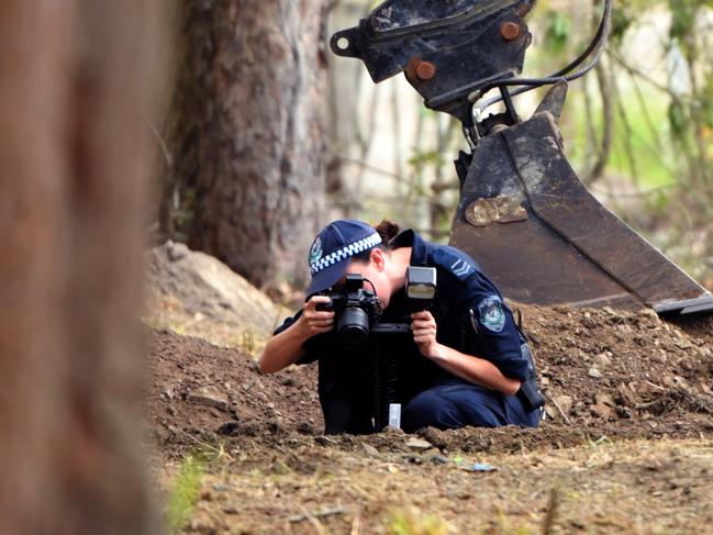 NSW Police and Rural Fire Service volunteers search an area of bush, 1km from the former home of William Tyrrell. Picture: AAP Image/Mick Tsikas