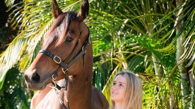 Strapper Jade Hampson with Guineas' hopeful Shift the Risk. Picture GLENN CAMPBELL