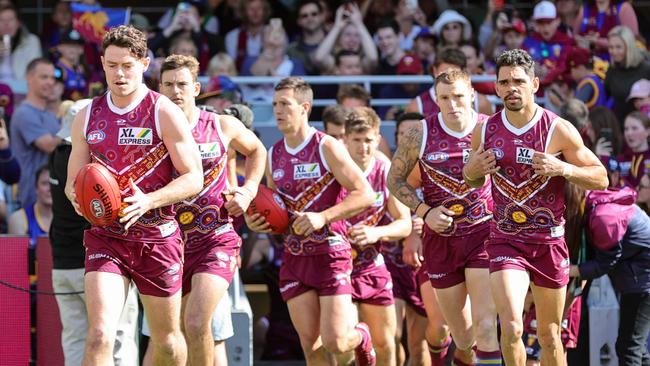 Lachie Neale leads the Lions out in Round 17. Picture: Russell Freeman/AFL Photos