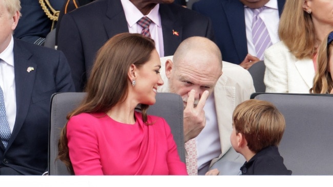 Mike Tindall playfully messes around with a restless Prince Louis during the Queen's Platinum Jubilee pageant celebrations. Picture: Getty Images