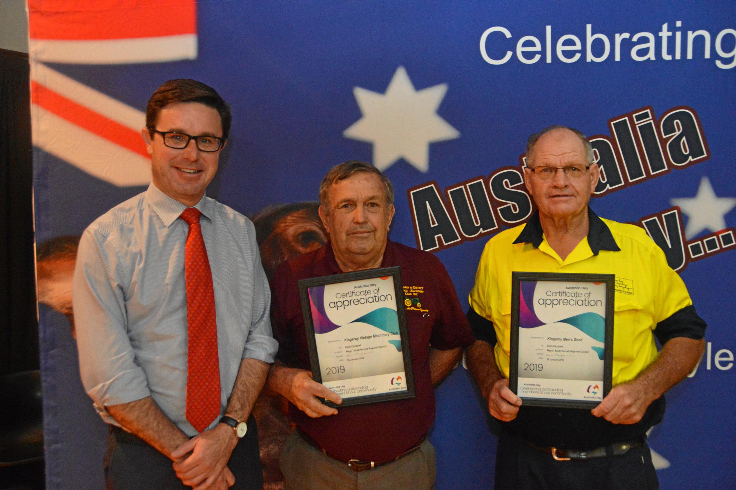 Winner of special appreciation awards for Kingaroy District and Machinary Club and Kingaroy men's shed in recognition of their community efoort responding to storm damage with Member for Maranoa David Littleproud  at the South Burnett Australia Day awards. Picture: Claudia Williams