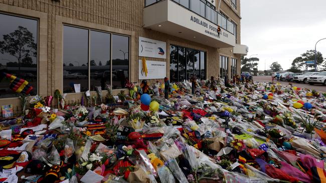 Tributes left for Phil Walsh outside the Adelaide Crows club office