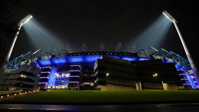 The Melbourne Cricket Ground turns blue in tribute to Victoria Police. Picture: AAP