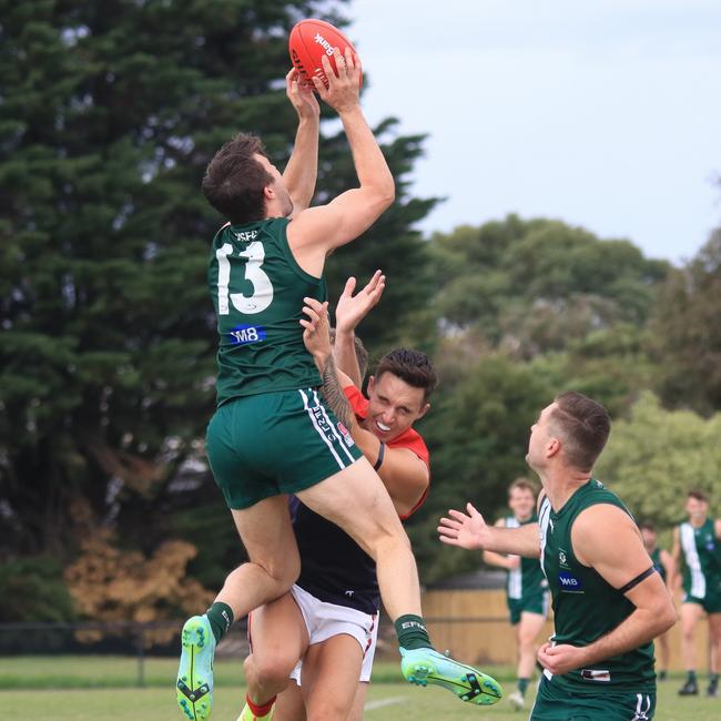 Wantirna South’s Marcus Jordan flies for a grab. Picture: Davis Harrigan