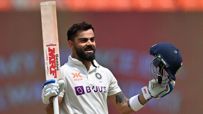 India's Virat Kohli celebrates after scoring a century (100 runs) during the fourth day of the fourth and final Test cricket match between India and Australia at the Narendra Modi Stadium in Ahmedabad on March 12, 2023. (Photo by Punit PARANJPE / AFP) / ----IMAGE RESTRICTED TO EDITORIAL USE - STRICTLY NO COMMERCIAL USE-----