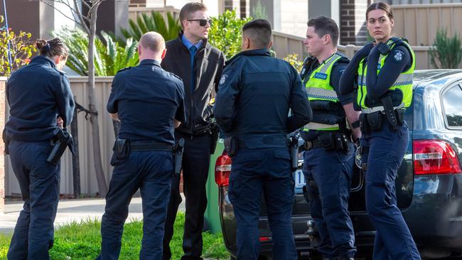 Police swarm the scene of the shooting. Picture: Jay Town