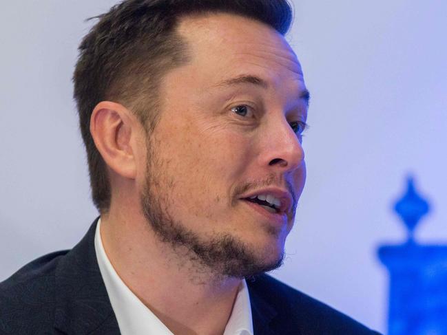 Tesla Motors CEO Elon Musk speaks at a press conference during the 67th International Astronautical Congress in Guadalajara, Mexico on September 27, 2016. / AFP PHOTO / HECTOR GUERRERO