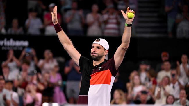 Grigor Dimitrov of Bulgaria celebrates after the men's singles final against Holger Rune of Denmark at the Brisbane International. Picture: William West / AFP.