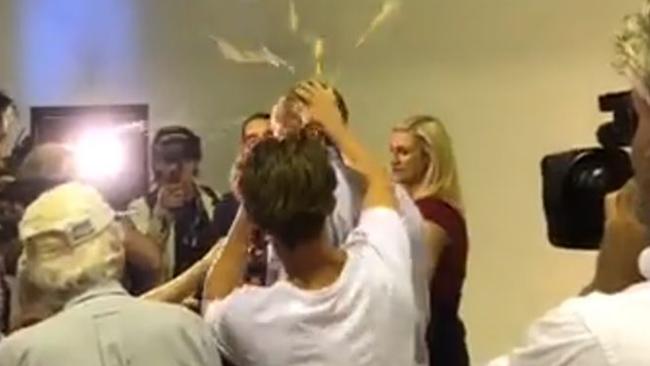 Senator Fraser Anning had an egg cracked over his head by a protester.