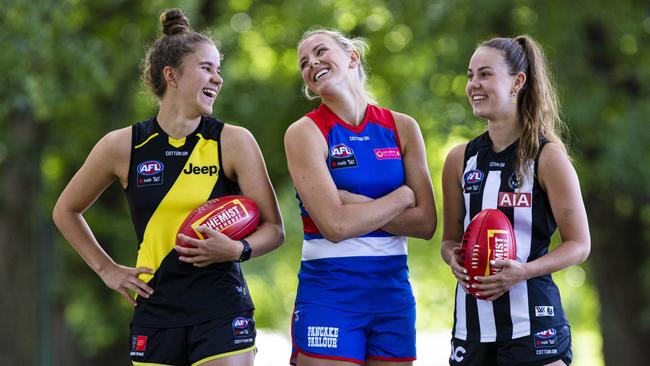 Richmond’s Ellie McKenzie, Western Bulldogs’ Gabby Newton and Collingwood’s Tarni Brown ahead of the start of the AFLW season next week. Picture: Aaron Francis