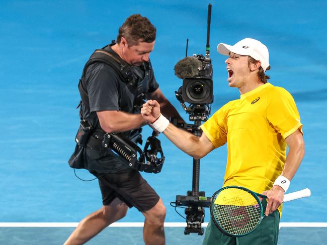 Australiaâs Alex de Minaur reacts after defeating Argentinaâs Tomas Martin Etcheverry during their menâs singles match at the United Cup on Ken Rosewall Arena in Sydney on December 28, 2024. (Photo by DAVID GRAY / AFP) / -- IMAGE RESTRICTED TO EDITORIAL USE - STRICTLY NO COMMERCIAL USE --