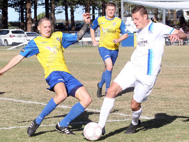 Surfers Paradise’s Bruno Gomez (right) in action against Broadbeach United in this year’s Gold Coast Premier League. Picture: Richard Gosling