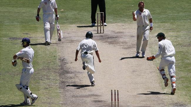 Batsman Kevin Pietersen is bowled by around his legs by bowler Shane Warne during second test of Australia v England Ashes series at Adelaide Oval in Adelaide.